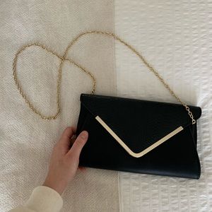 Black leather clutch